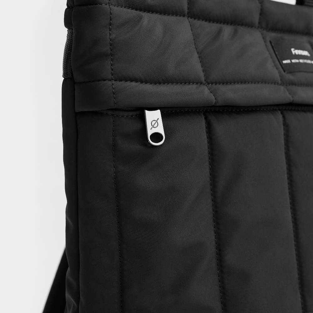 zipper detail on the external pocket of the Finnson RAE eco changing backpack