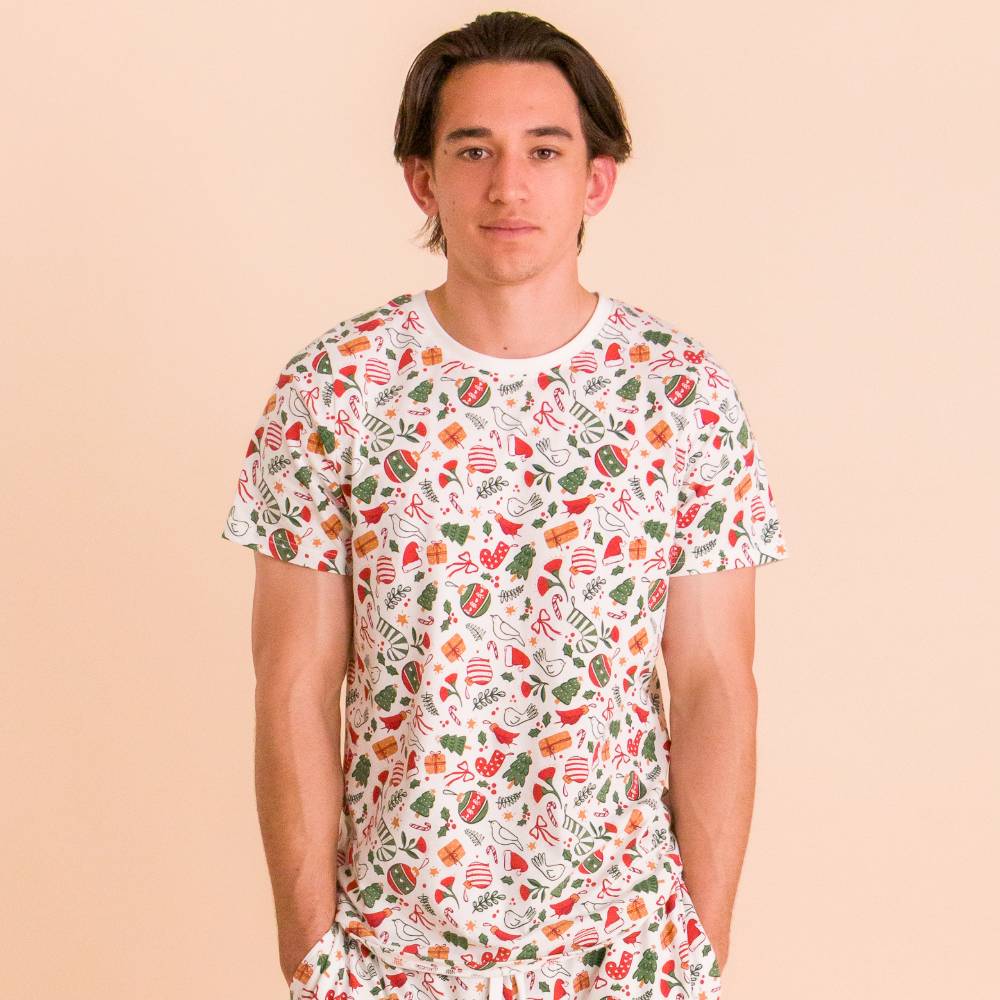 Young man wearing The Sleep Store Christmas PJ Top