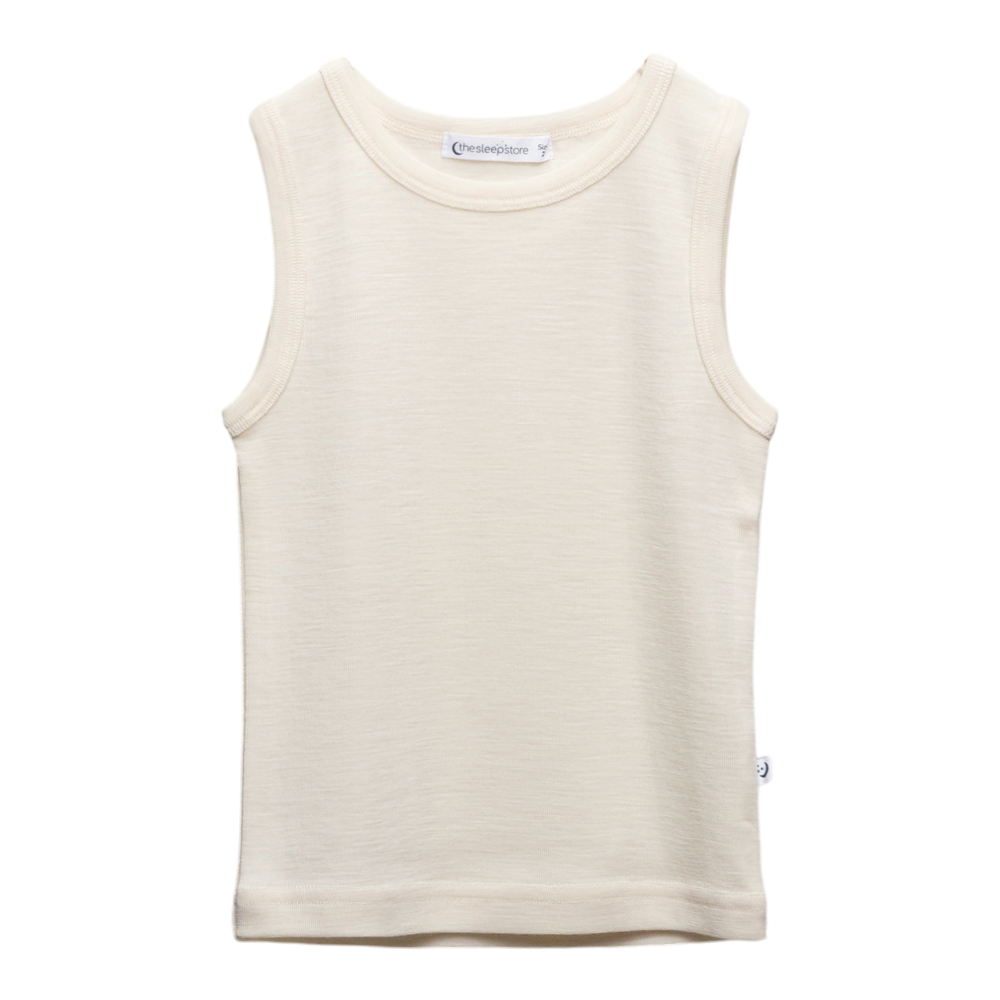 A clearcut image of the Sleep Store Deluxe New Zealand Merino Wool Kids Singlet in the colour Ecru.
