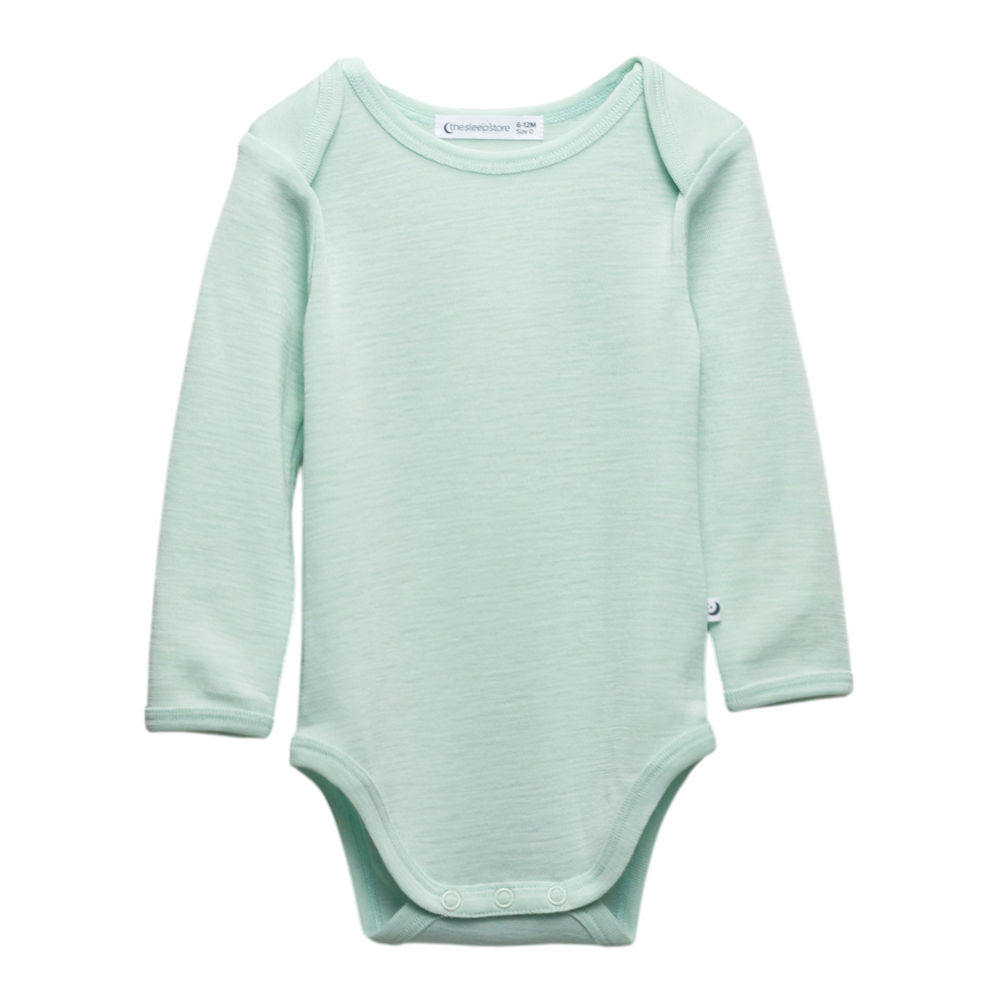 A clearcut of the Sleep Store Deluxe New Zealand Merino Wool Long Sleeve Bodysuit in the colour Sage.