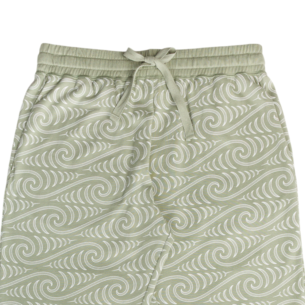 A closeup waist shot of the Woolbabe X BO & KO Relax Lounge Pants in Flax Ngaru.