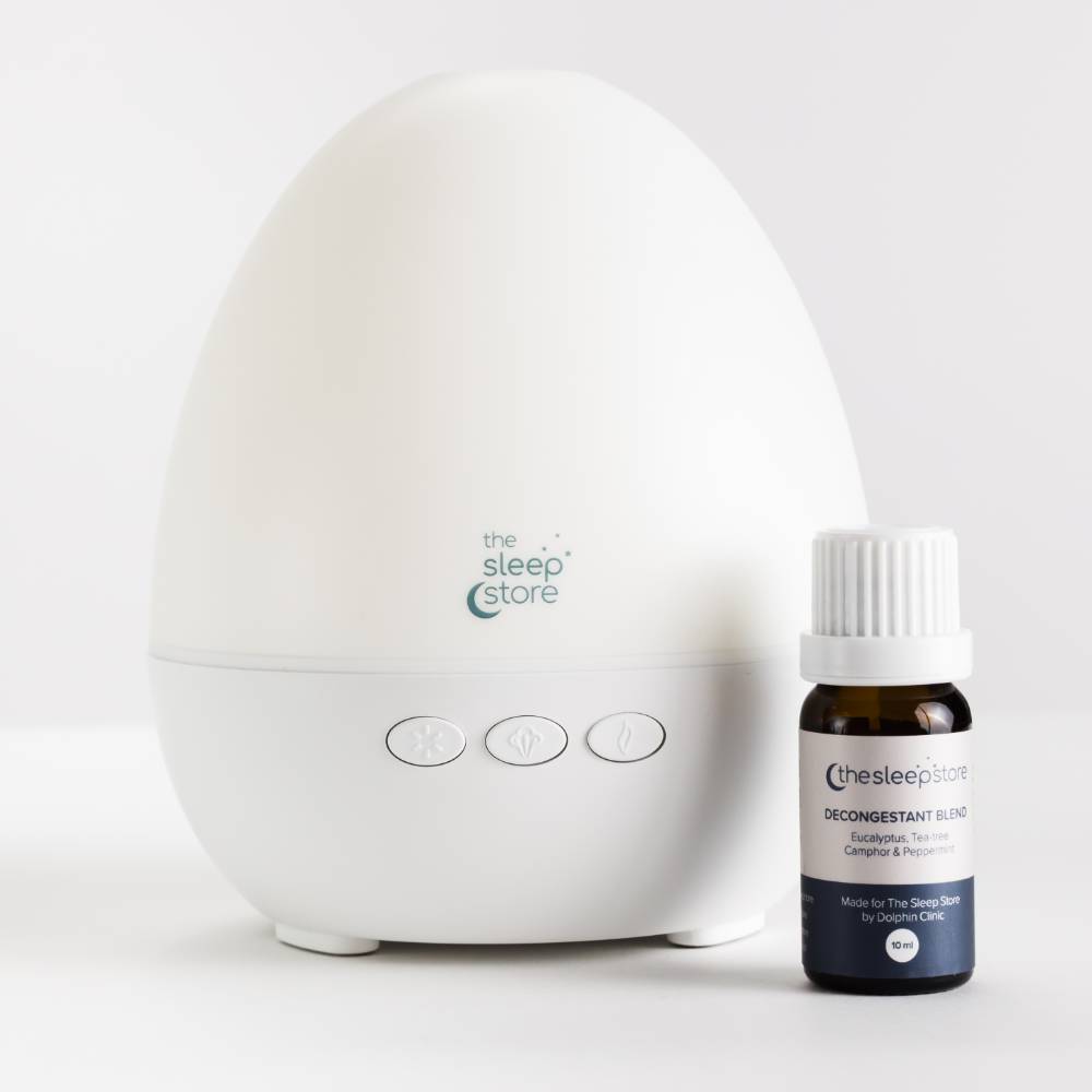 An image of The Sleep Store Decongestant Blend with a Sleep Store Aroma Diffuser.