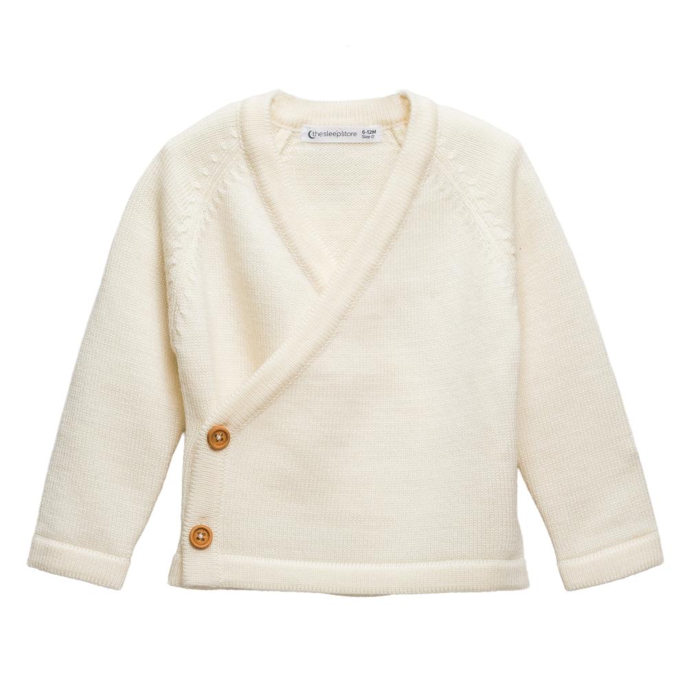A clearcut image, front view of The Sleep Store Merino Knitwear Kimono Cardigan in Cream.