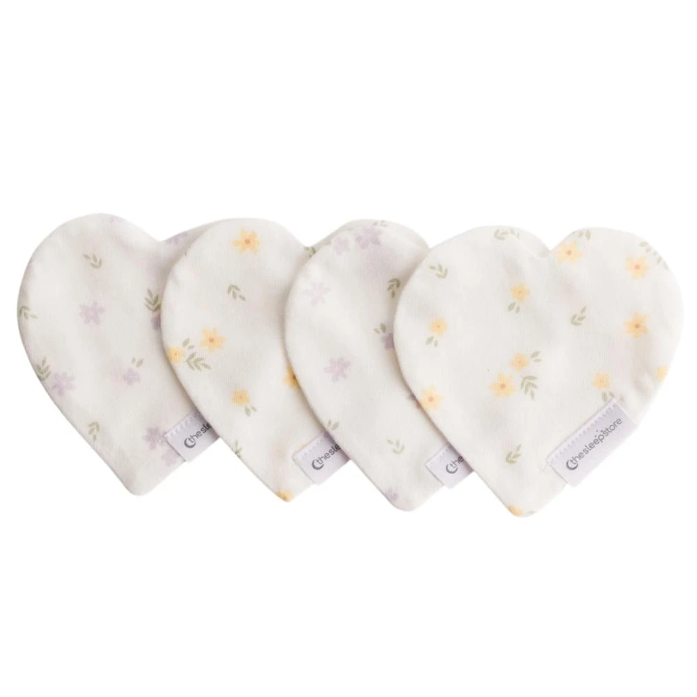 A clearcut image of The Sleep Store NICU Hearts. 4 cotton hearts in a mix of floral patterns.