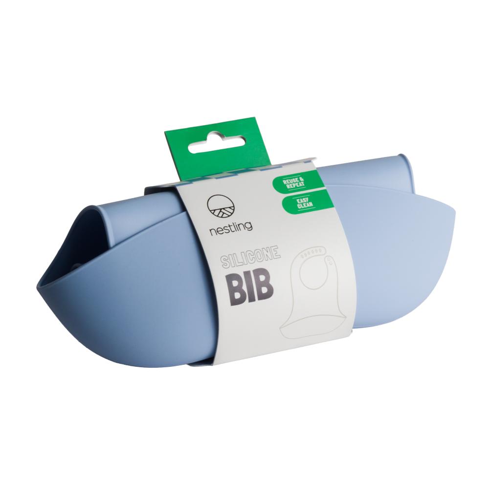A clearcut image of the Nestling Silicone Bib in the colour Dusty Blue, wrapped in packaging.