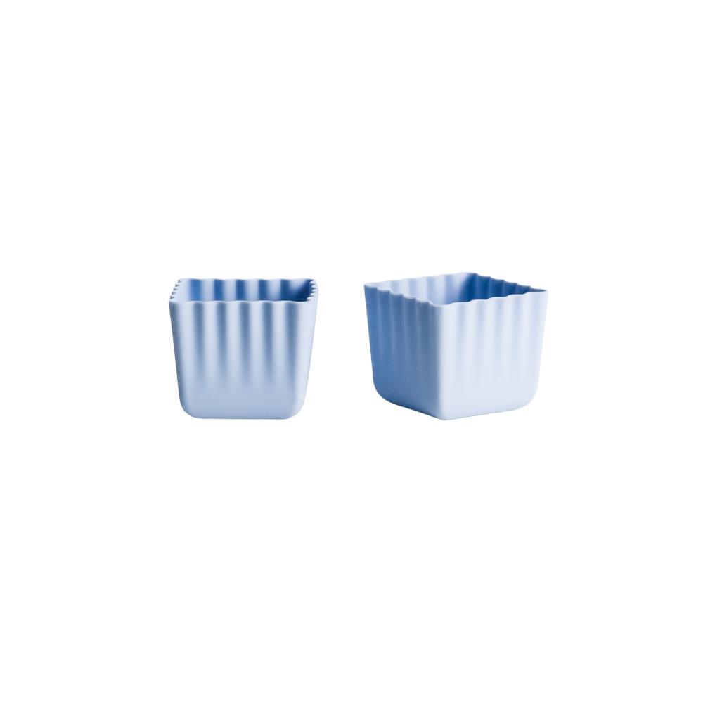 A clearcut image of 2 x Nestling Silicone Bento Cups in the colour Dusty Blue.