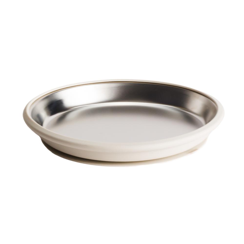 A clearcut image of the Nestling Stainless Steel 20cm Flat Suction Plate in the colour Oat.