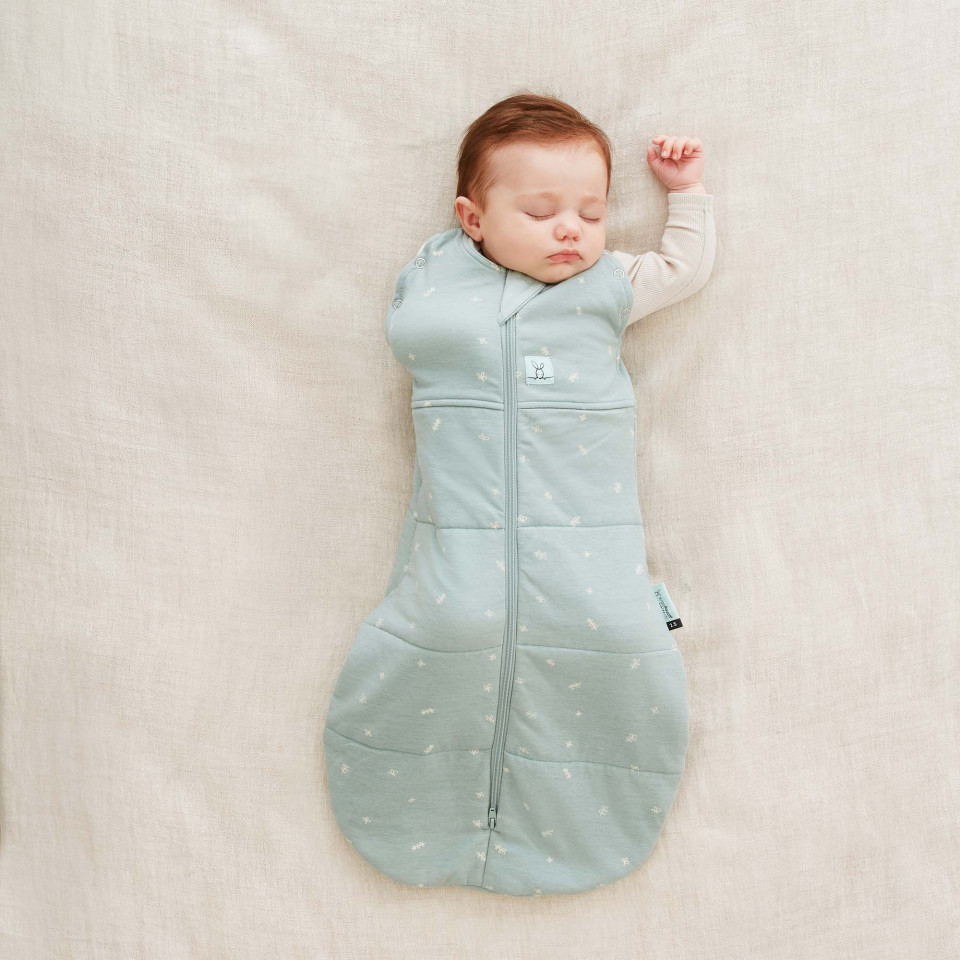 Baby with arm out in Ergopouch 2.5 Tog Cocoon Swaddle