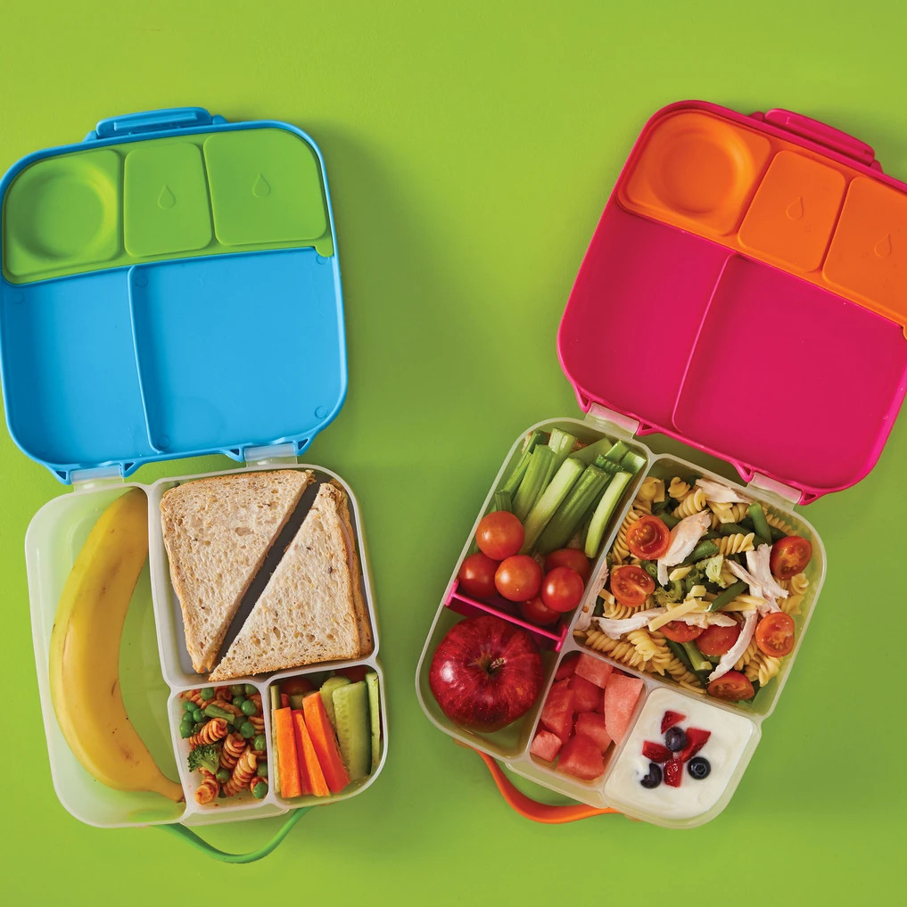 two b.box lunchboxes filled with food