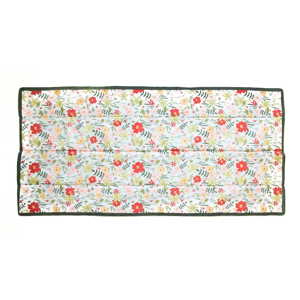 Flat lay of large Little Unicorn Water-resistant picnic blanket 10x10ft (1.5m x 3m) in Primrose Patch design - cream background with flowers and dark green edging.