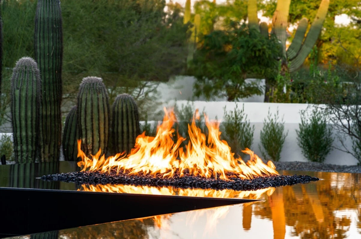 Custom-designed fire bowl in a luxury patio