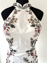 White, sexy, modern wedding cheongsam (qipao) with open back, halter neck. A-line style with thigh side split. Tea ceremony, Auckland, New Zealand White, sexy, modern wedding cheongsam (qipao) with open back, halter neck. A-line style with thigh side split. Tea ceremony, Auckland, New Zealand