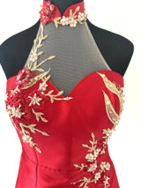 Halter neck red cheongsam gown featuring elegant floral embroidery and asymmetrical neckline. Perfect for tea ceremonies or modern cultural weddings. Available to purchase or hire at Bridal Fusion by Steph in Auckland. Under $2,000, with over 10+ styles to try on. Halter neck red cheongsam gown featuring elegant floral embroidery and asymmetrical neckline. Perfect for tea ceremonies or modern cultural weddings. Available to purchase or hire at Bridal Fusion by Steph in Auckland. Under $2,000, with over 10+ styles to try on.