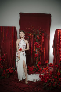 White, sexy, modern wedding cheongsam (qipao) with open back, halter neck. A-line style with thigh side split. Tea ceremony, Auckland, New Zealand White, sexy, modern wedding cheongsam (qipao) with open back, halter neck. A-line style with thigh side split. Tea ceremony, Auckland, New Zealand