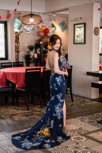 Red halter gown featuring a keyhole neckline and over 100+ gold and red embroidered florals. Available to hire or purchase at Bridal Fusion by Steph. Perfect for modern tea ceremonies or evening receptions. Under $2,000. Red halter gown featuring a keyhole neckline and over 100+ gold and red embroidered florals. Available to hire or purchase at Bridal Fusion by Steph. Perfect for modern tea ceremonies or evening receptions. Under $2,000.