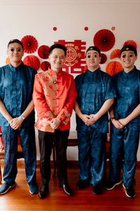 Asian groom and 3 groomsmen wearing matching blue dragon Chinese outfits for tea ceremony - Bridal Fusion by Steph