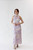 Elegant halter cheongsam in lilac showing collarbone with grass and floral details.  Great for cultural, wedding, special occasions