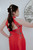 Backless red qipao dress with diamond cutout back and floral embroidery