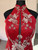 Close-up of red cheongsam bodice with 3D pearl and crystal magnolia embroidery and sheer keyhole front panel – Bridal Fusion NZ
