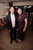 Royal purple cheongsam with all-over black velvet swirl appliqué and gold glitter beading worn at a wedding reception – Bridal Fusion NZ