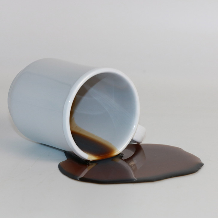 Fake Black Coffee Spill in a White Mug