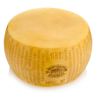 Cheese replica Parmesan Reggiano, with dish