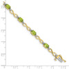 7" 10k Yellow Gold Peridot and Diamond Infinity Bracelet