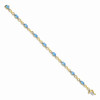 7" 14k Yellow Gold Blue Topaz and Diamond Infinity Bracelet