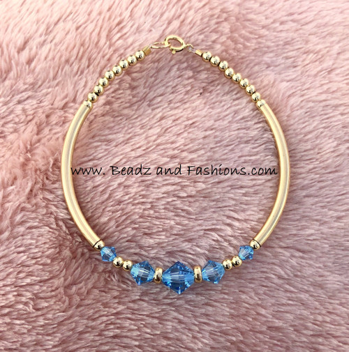 14k gold March skinny bangle