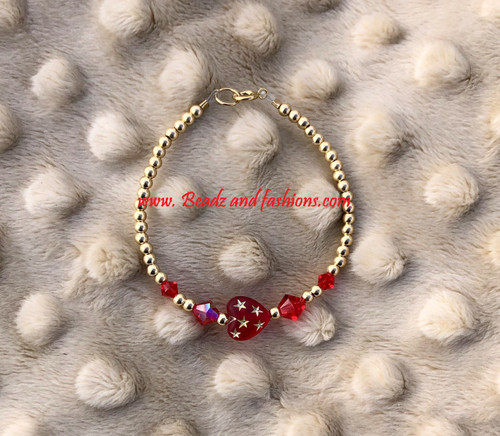14k gold July heart stardust bracelet kids