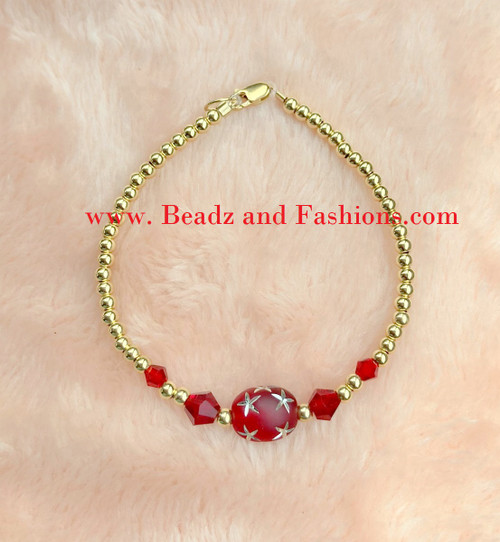 14k gold July oval stardust bracelet