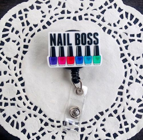 Nail boss badge reel