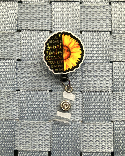 Social Worker sunflower planar badge reel