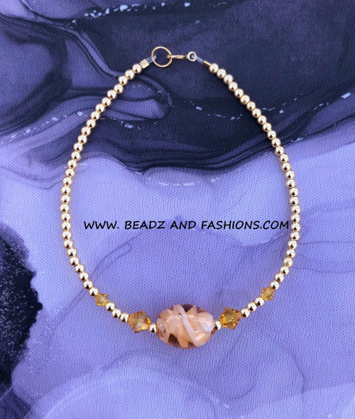 14k gold November oval bracelet #1