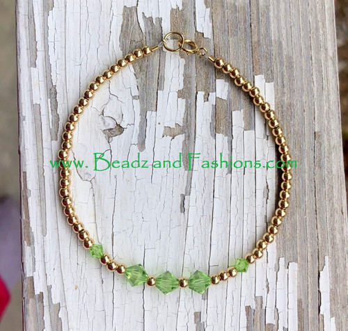 14k gold August birthstone bracelet #1A