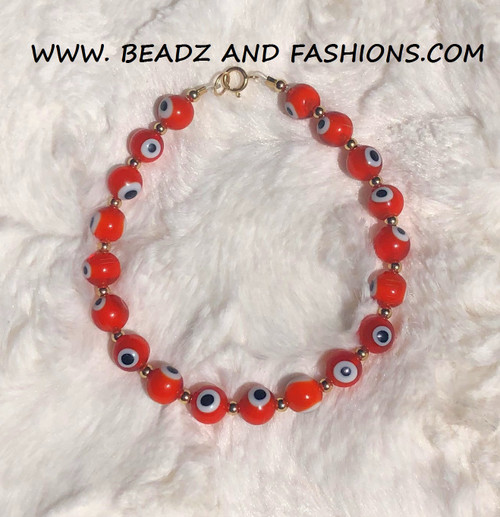 14k Gold evil eye ORANGE bracelet