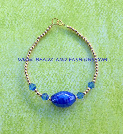 14k gold SEPTEMBER oval swirl bracelet