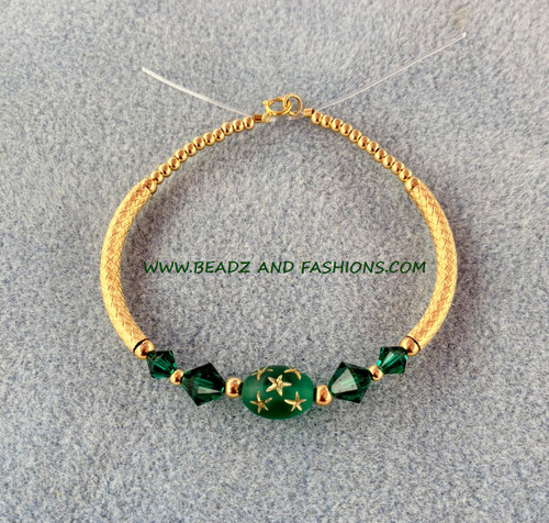 14k gold MAY Medium oval stardust bangle #1