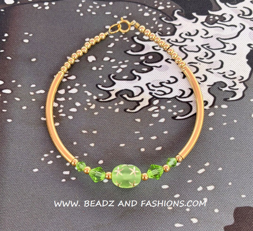 14k gold AUGUST oval stardust skinny bangle #1
