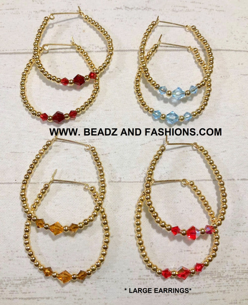 14k gold Any color Large hoop earrings.