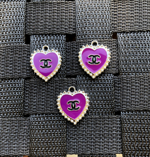 Purple heart metal charm.