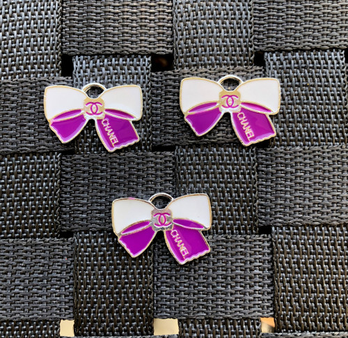 Purple bow metal charm