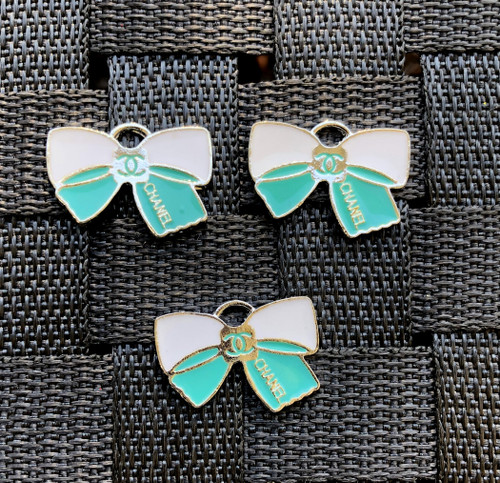 Teal bow metal charm