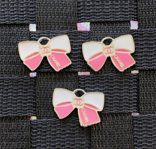 pink bow metal charm
