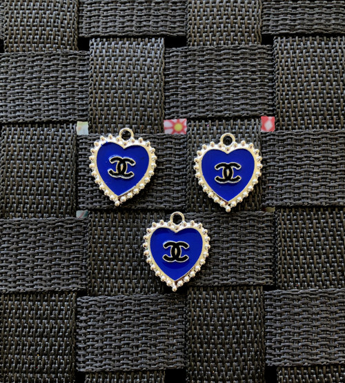 Royal heart metal charm.