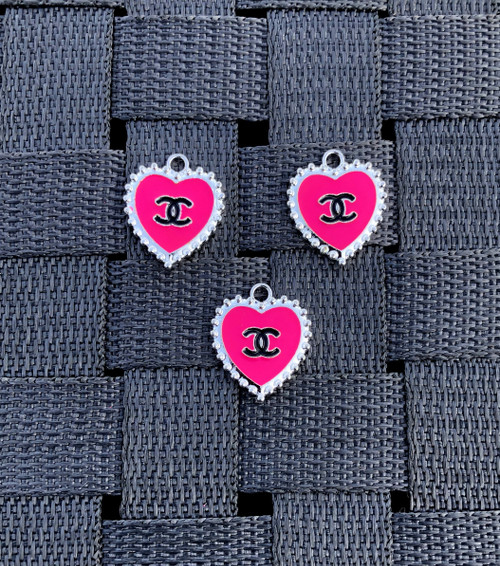 Hot pink heart metal charm.