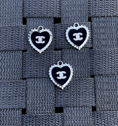 Black heart metal charm.