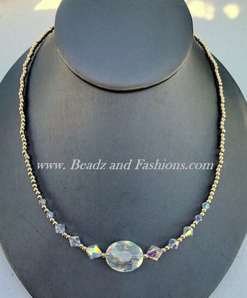 14k gold oval crystal clear necklace