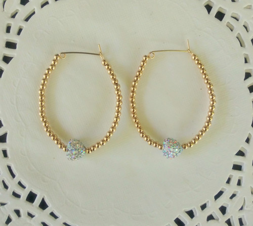 14k gold pave small heart hoop earrings.