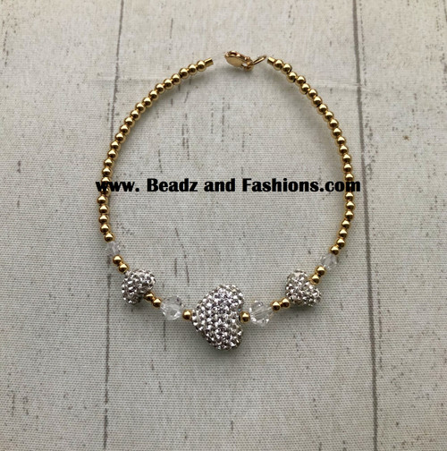 14k gold Mini heart pave bracelet .